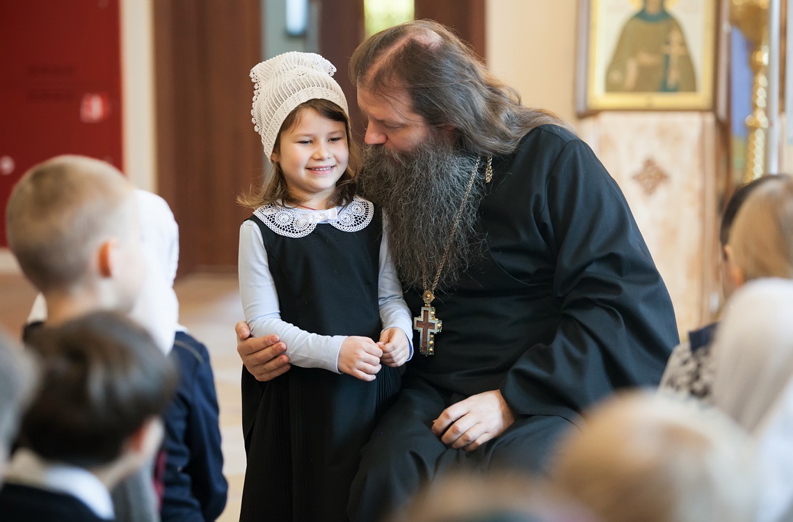 conversation between priest and a child