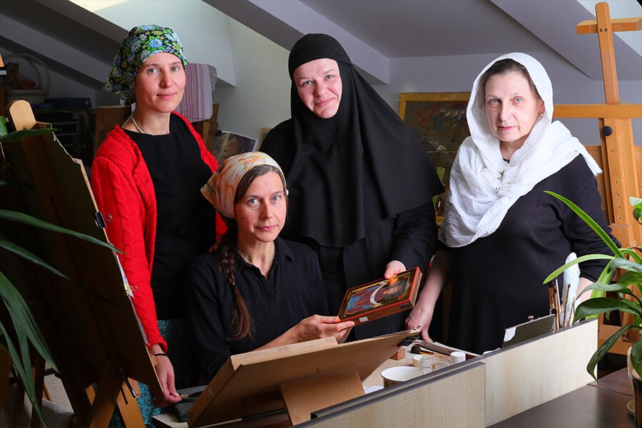 the iconographers in the icon setting workshop