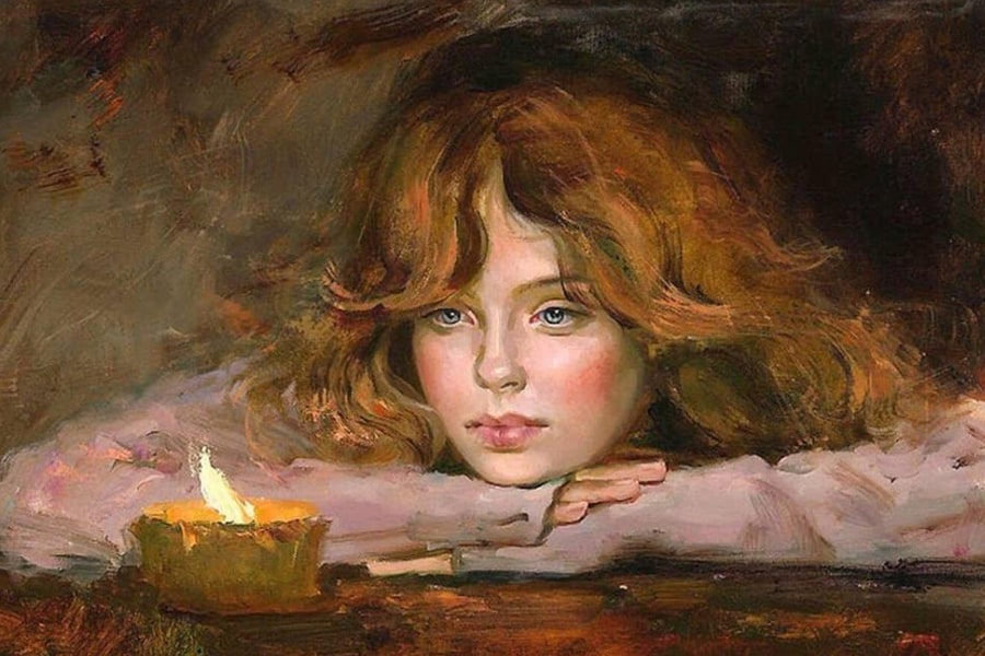 a girl looking at a candle