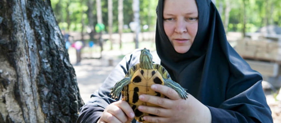 Nun Irina with tortoise