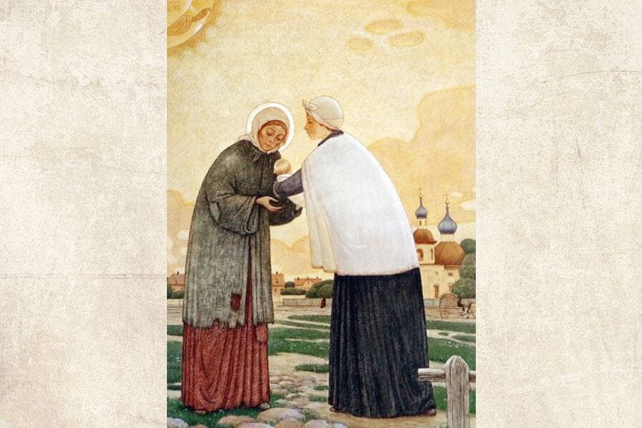 The saint takes the child in her arms