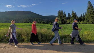 Artisans from St Elisabeth Convent lay mosaics in a Romanian monastery